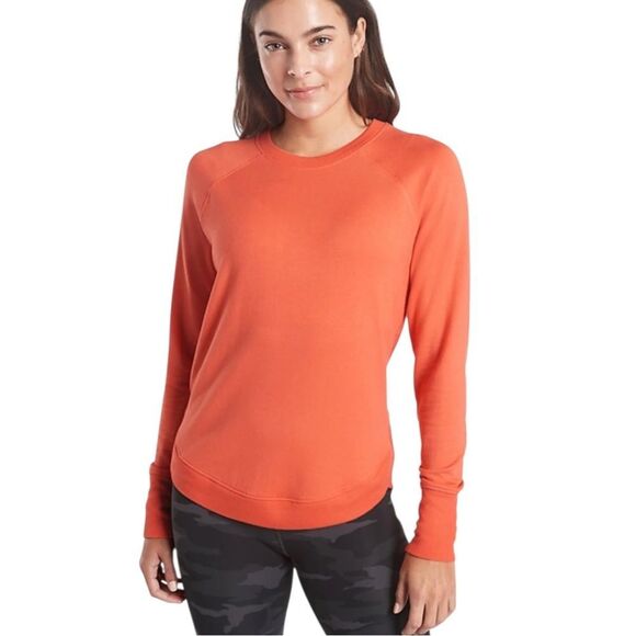 Athleta Women's Orange Haze Mindset Sweatshirt Relax Fit Tulip Hem Small NWOT - Picture 1 of 11